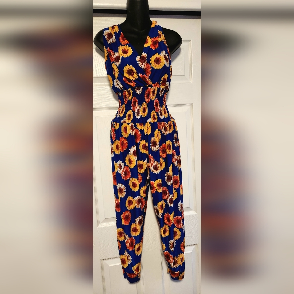 EUC blue flowered romper size large